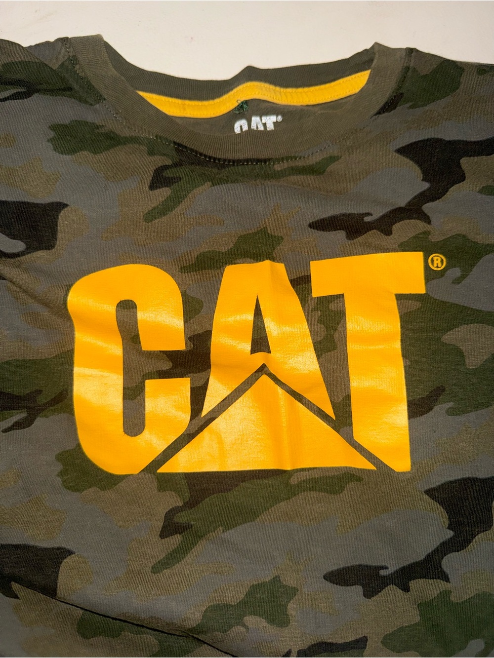 Caterpillar Camouflage Tee with Bold Yellow Logo